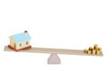 House and gold coins on the seesaw,3D illustration.