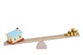 House and gold coins on the seesaw,3D illustration.