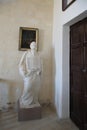 Vittoriosa, Malta, August 2019. Statue of a saint with a book in the Museum of the Holy Inquisition.