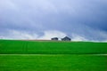 House in the green field and blue sky Royalty Free Stock Photo