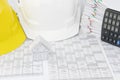 House have blur white and yellow engineer hat as background Royalty Free Stock Photo