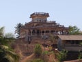 A house on a hill. it is also three storeyed