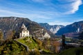 House on The Hill with Blue Sky and Mountain - Hallstatt, Austria Royalty Free Stock Photo