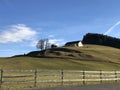 A house on the hill on the edge of the forest