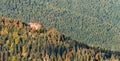 House on a hill in fall colored forest, Vosges, Alsace, France Royalty Free Stock Photo