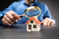 House Or Home Inspection Using Magnifying Glass. Tax