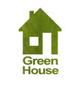 House icon on a white isolated background from a gold leaf. The inscription Green House. Close-up Royalty Free Stock Photo