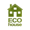 House icon on a white isolated background from a green leaf. The inscription ECO HOUSE. Close-up Royalty Free Stock Photo