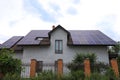 House with solar panels on roof. Alternative energy source Royalty Free Stock Photo