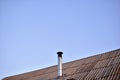 The house with an iron chimney pipe furnace Royalty Free Stock Photo