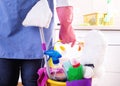 House keeper with cleaning equipment in bucket