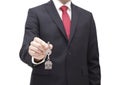 House Key In Businessman Hand