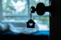 House key with home keyring in keyhole Royalty Free Stock Photo