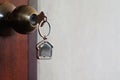 House key with home keyring in keyhole Royalty Free Stock Photo