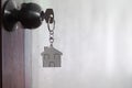 House key with home keyring in keyhole Royalty Free Stock Photo