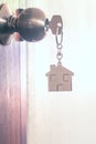 House key with home keyring in keyhole Royalty Free Stock Photo