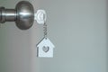 House key with home keyring in keyhole Royalty Free Stock Photo