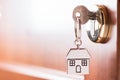 House key on a house brown door Royalty Free Stock Photo