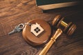 house key with judge and law book Royalty Free Stock Photo