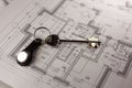 House keys on blueprint paper - properties and real estate concept Royalty Free Stock Photo