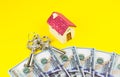 House, keys and dollars. Buying and renting real estate. Bank credit for property. Save money. Invest for future home Royalty Free Stock Photo