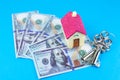 House, keys and dollars. Buying and renting real estate. Bank credit for property. Save money. Invest for future home Royalty Free Stock Photo