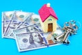 House, keys and dollars. Buying and renting real estate. Bank credit for property. Save money. Invest for future home Royalty Free Stock Photo