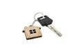 House keys with house shaped keychain, isolated white background