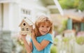 House in kids hands. Family home, home protecting insurance concept, Child boy building house, home care. Happy kid Royalty Free Stock Photo