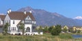 House beside a lake with view of the mountain Royalty Free Stock Photo