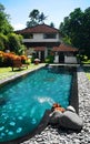 House with large outdoor swimming pool Royalty Free Stock Photo