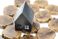 House layout. Miniature paper house. On a wooden table. Building.