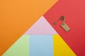 House made of colorfull paper background concept for real estate, moving home or renting property Royalty Free Stock Photo