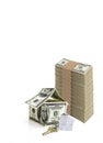 House made from hundred dollar bills and a key Royalty Free Stock Photo