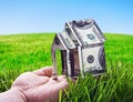 House made of money in hand Royalty Free Stock Photo