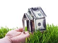 House made of money in hand isolated Royalty Free Stock Photo