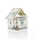 House made of money isolated on white Royalty Free Stock Photo