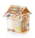 House made of money on a white Royalty Free Stock Photo