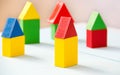 House made of old cubes. Wooden colorful building blocks. Vintage childrens toys. the concept of building a house, apartments for