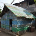 House made of plastic bottles, creative architecture, the concept of environmental protection, respect for nature, Royalty Free Stock Photo