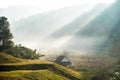 The house in the middle of the valley and nature, the sun shone through the mountains to this house. Royalty Free Stock Photo