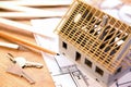 House miniature under construction on an architect desk Royalty Free Stock Photo