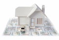 House miniature with car isolated in white background for real estate and construction concepts. House miniature designed and crea Royalty Free Stock Photo