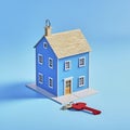House mockup with keys next to it on blue background. Royalty Free Stock Photo