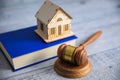 House model on book with judge Royalty Free Stock Photo