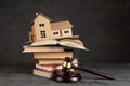 House model, gavel and books on the desk, Real property law concept, real estate auction Royalty Free Stock Photo