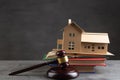 House model, gavel and books on the desk, Real property law concept, real estate auction Royalty Free Stock Photo