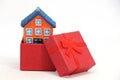 House model in gift box. Royalty Free Stock Photo