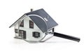 House model with magnifying glass home inspection or searching for a house Royalty Free Stock Photo