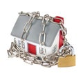 House model plastic with chain and padlock Royalty Free Stock Photo
